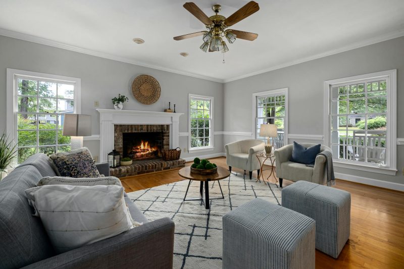 Bright living room with fireplace and modern furniture